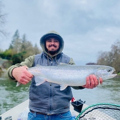 Holding up huge fish for the camera