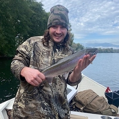 Holding up fish caught on half-day trip