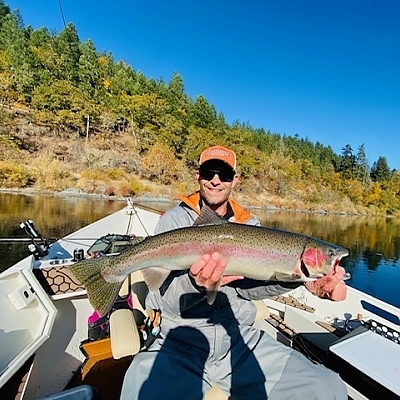  Fisherman holding up catch from Medford trip