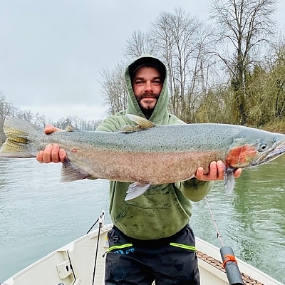 Holding up fish with both hands